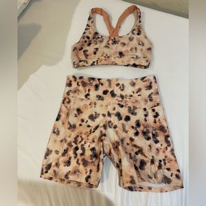 Cheetah work out gear sports bra and biker shorts set. Marika brand